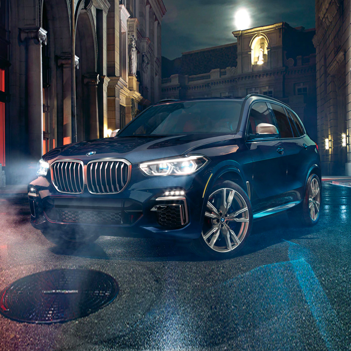 bmw black suv with headlights on parked on street