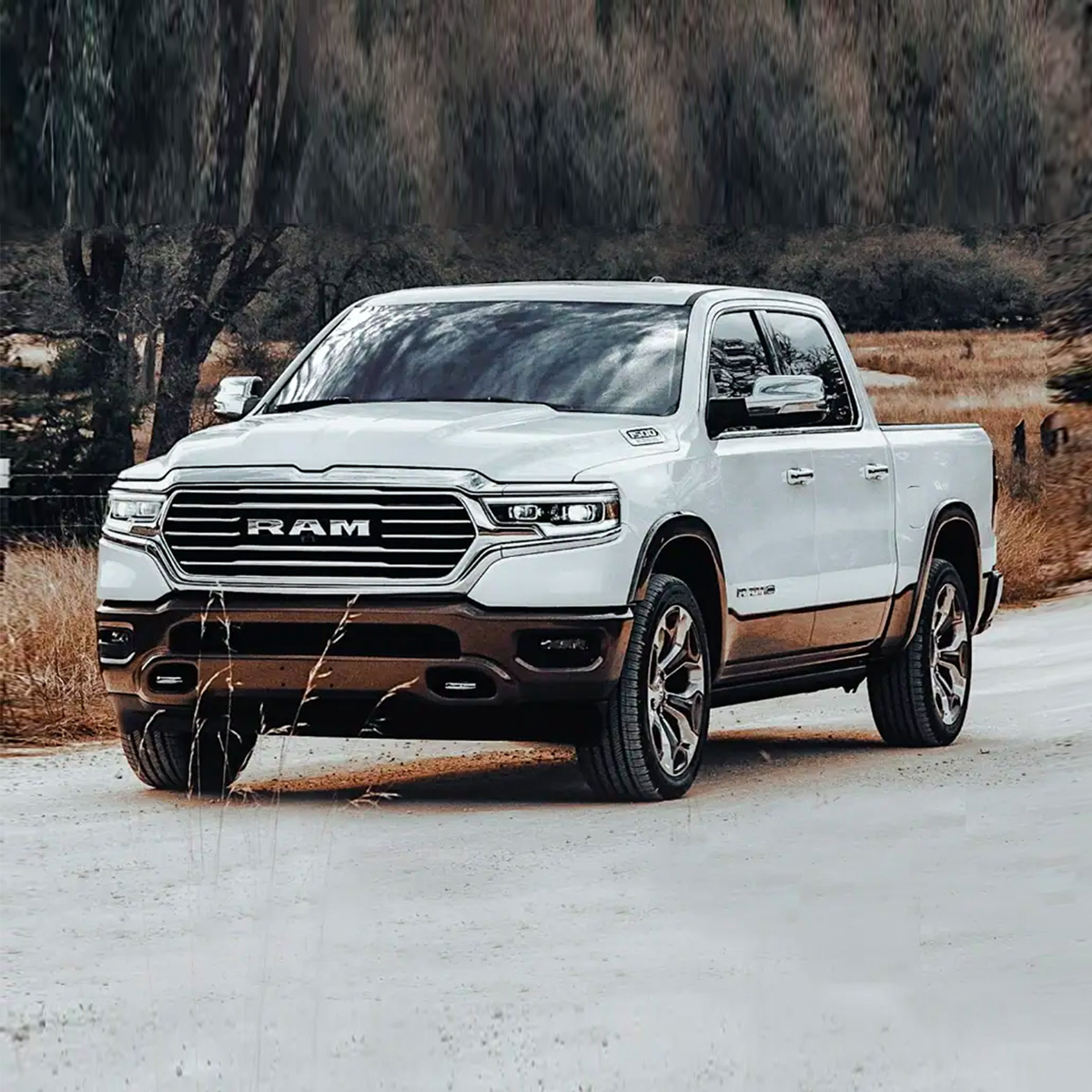 2022 Ram 1500 driving down a road